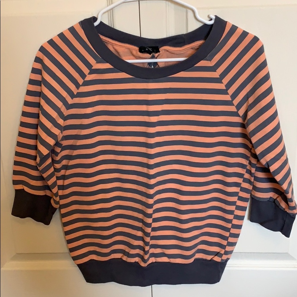 Orange and grey striped top